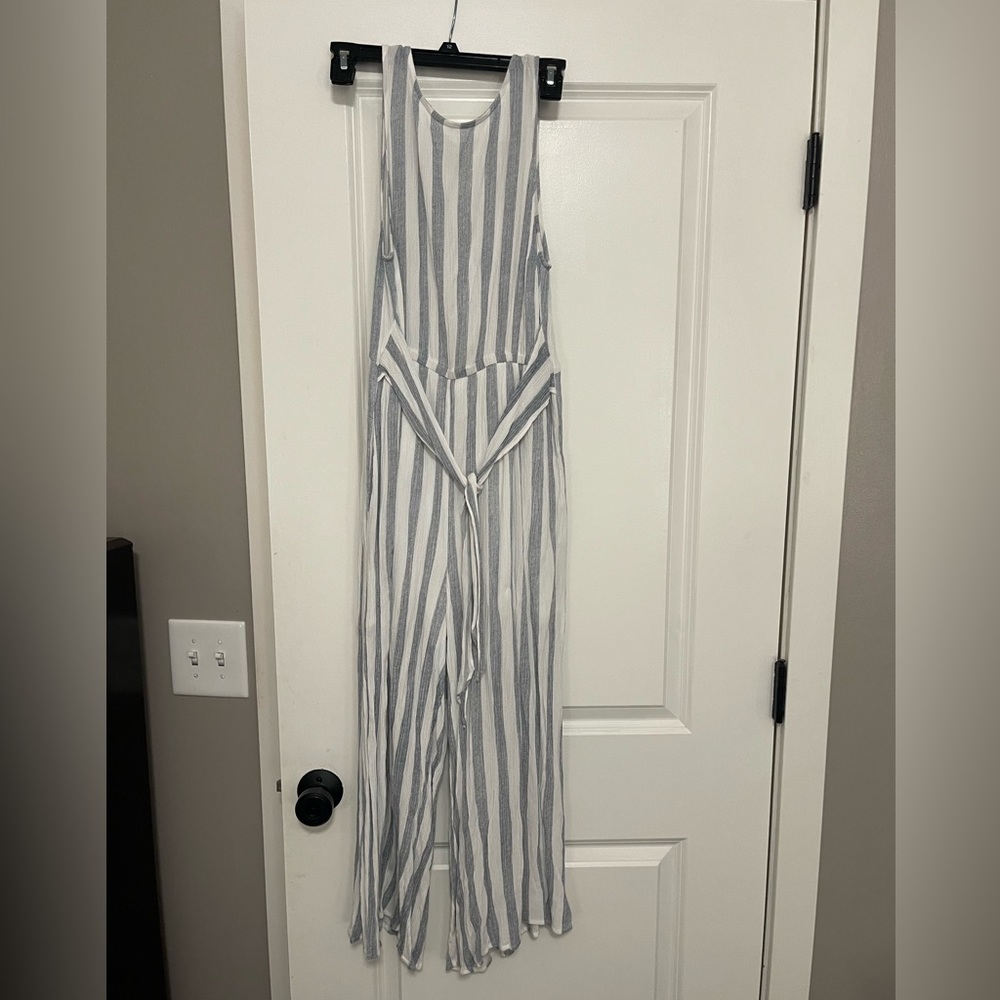 Vici white and grayish blue stripped jumpsuit size medium. Great condition